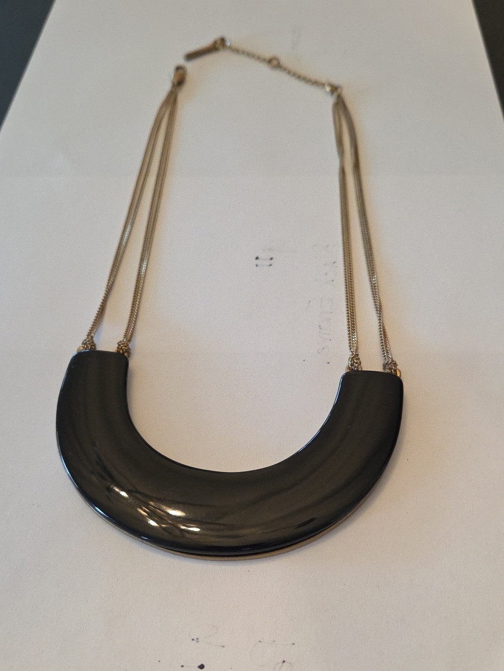 KENNETH COLE Glossy Black Crescent Necklace with Gold-Tone Chains